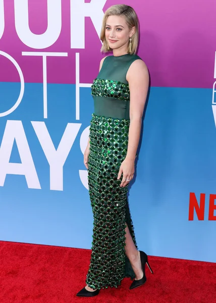 American actress Lili Reinhart wearing Miu Miu arrives at the Los Angeles Premiere Of Netflix's 'Look Both Ways' held at the Netflix Tudum Theater on August 16, 2022 in Hollywood, Los Angeles, California, United States. 
