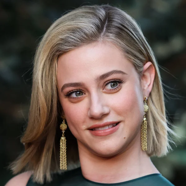 American actress Lili Reinhart wearing Miu Miu arrives at the Los Angeles Premiere Of Netflix's 'Look Both Ways' held at the Netflix Tudum Theater on August 16, 2022 in Hollywood, Los Angeles, California, United States. 