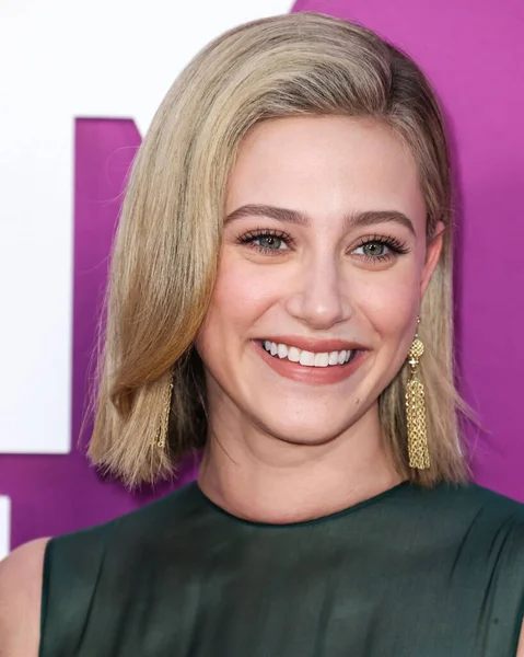 American actress Lili Reinhart wearing Miu Miu arrives at the Los Angeles Premiere Of Netflix's 'Look Both Ways' held at the Netflix Tudum Theater on August 16, 2022 in Hollywood, Los Angeles, California, United States. 