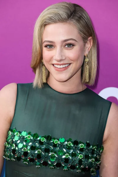American actress Lili Reinhart wearing Miu Miu arrives at the Los Angeles Premiere Of Netflix's 'Look Both Ways' held at the Netflix Tudum Theater on August 16, 2022 in Hollywood, Los Angeles, California, United States. 
