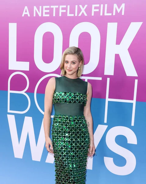 American actress Lili Reinhart wearing Miu Miu arrives at the Los Angeles Premiere Of Netflix's 'Look Both Ways' held at the Netflix Tudum Theater on August 16, 2022 in Hollywood, Los Angeles, California, United States. 