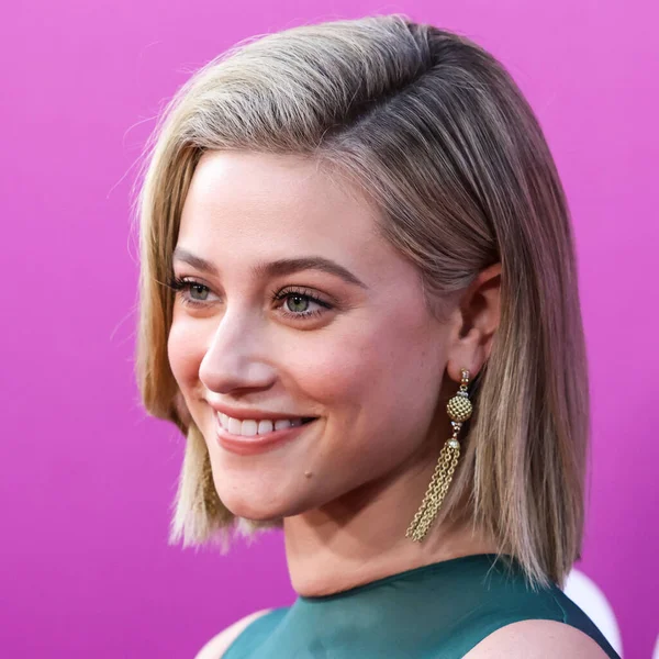 American actress Lili Reinhart wearing Miu Miu arrives at the Los Angeles Premiere Of Netflix's 'Look Both Ways' held at the Netflix Tudum Theater on August 16, 2022 in Hollywood, Los Angeles, California, United States. 