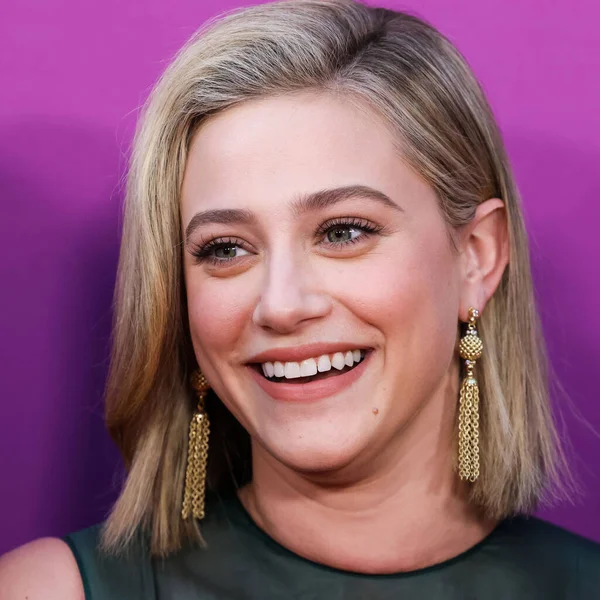 American actress Lili Reinhart wearing Miu Miu arrives at the Los Angeles Premiere Of Netflix's 'Look Both Ways' held at the Netflix Tudum Theater on August 16, 2022 in Hollywood, Los Angeles, California, United States. 