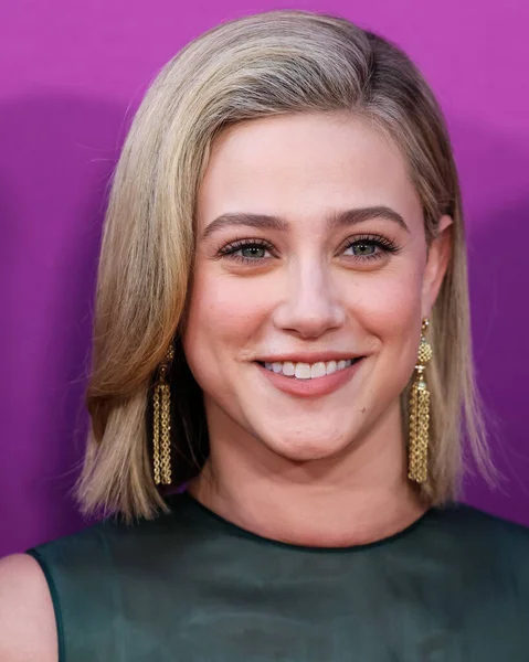 American actress Lili Reinhart wearing Miu Miu arrives at the Los Angeles Premiere Of Netflix's 'Look Both Ways' held at the Netflix Tudum Theater on August 16, 2022 in Hollywood, Los Angeles, California, United States. 