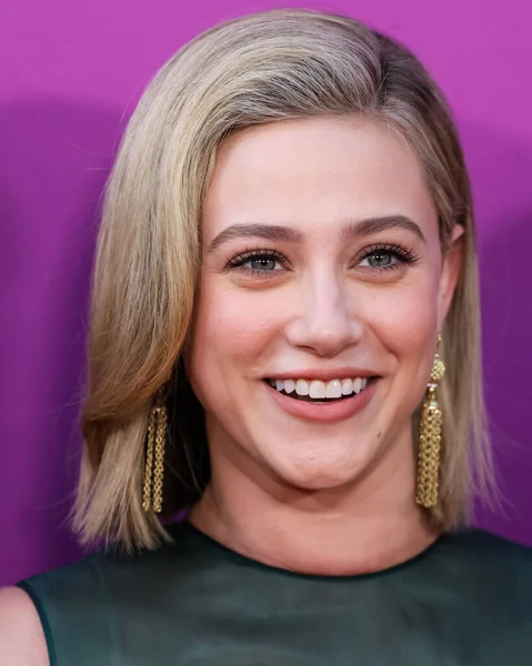 American actress Lili Reinhart wearing Miu Miu arrives at the Los Angeles Premiere Of Netflix's 'Look Both Ways' held at the Netflix Tudum Theater on August 16, 2022 in Hollywood, Los Angeles, California, United States. 