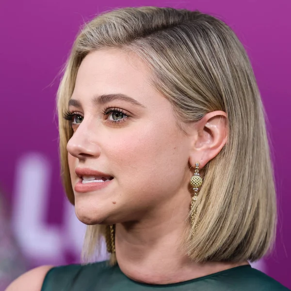 American actress Lili Reinhart wearing Miu Miu arrives at the Los Angeles Premiere Of Netflix's 'Look Both Ways' held at the Netflix Tudum Theater on August 16, 2022 in Hollywood, Los Angeles, California, United States. 