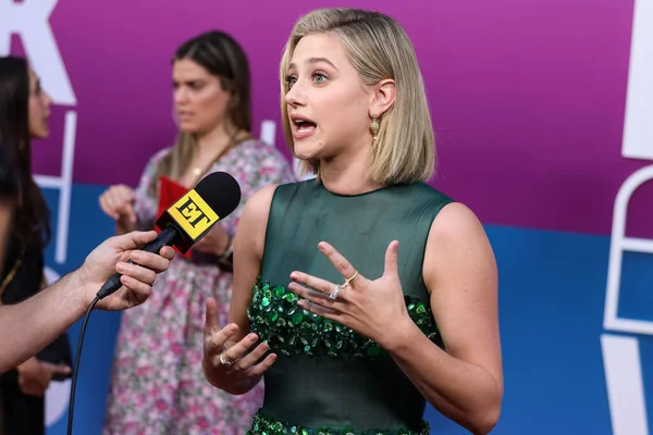 American actress Lili Reinhart wearing Miu Miu is interviewed by Entertainment Tonight (ET) at the Los Angeles Premiere Of Netflix's 'Look Both Ways' held at the Netflix Tudum Theater on August 16, 2022 in Hollywood, Los Angeles, California