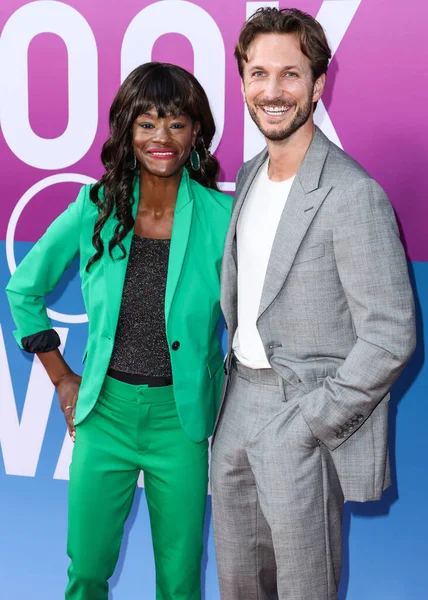 American actress Sufe Bradshaw and boyfriend/actor Matt Atwater arrive at the Los Angeles Premiere Of Netflix's 'Look Both Ways' held at the Netflix Tudum Theater on August 16, 2022 in Hollywood, Los Angeles, California, United States. 