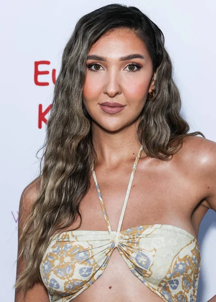 Australian model and content creator Nadia Peri arrives at the Eugenia Kuzmina And Playboy Launch Reception held at The Godfrey Hotel Hollywood on August 18, 2022 in Hollywood, Los Angeles, California, United States. 