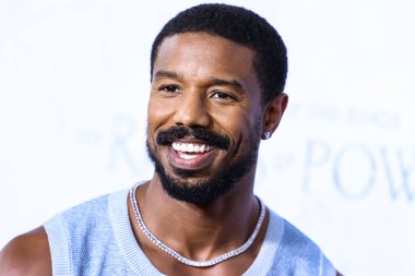 American actor Michael B. Jordan wearing a Chanel top and The Row trousers arrives at the Los Angeles Premiere Of Amazon Prime Video's 'The Lord Of The Rings: The Rings Of Power' Season 1 held at The Culver Studios on August 15, 2022 in Culver City