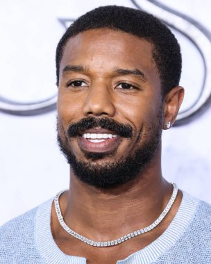 American actor Michael B. Jordan wearing a Chanel top and The Row trousers arrives at the Los Angeles Premiere Of Amazon Prime Video's 'The Lord Of The Rings: The Rings Of Power' Season 1 held at The Culver Studios on August 15, 2022 in Culver City
