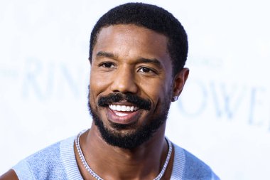 American actor Michael B. Jordan wearing a Chanel top and The Row trousers arrives at the Los Angeles Premiere Of Amazon Prime Video's 'The Lord Of The Rings: The Rings Of Power' Season 1 held at The Culver Studios on August 15, 2022 in Culver City