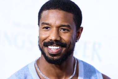 American actor Michael B. Jordan wearing a Chanel top and The Row trousers arrives at the Los Angeles Premiere Of Amazon Prime Video's 'The Lord Of The Rings: The Rings Of Power' Season 1 held at The Culver Studios on August 15, 2022 in Culver City
