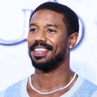 American actor Michael B. Jordan wearing a Chanel top and The Row trousers arrives at the Los Angeles Premiere Of Amazon Prime Video's 'The Lord Of The Rings: The Rings Of Power' Season 1 held at The Culver Studios on August 15, 2022 in Culver City