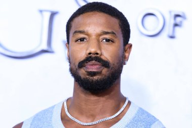 American actor Michael B. Jordan wearing a Chanel top and The Row trousers arrives at the Los Angeles Premiere Of Amazon Prime Video's 'The Lord Of The Rings: The Rings Of Power' Season 1 held at The Culver Studios on August 15, 2022 in Culver City
