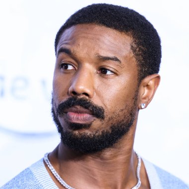 American actor Michael B. Jordan wearing a Chanel top and The Row trousers arrives at the Los Angeles Premiere Of Amazon Prime Video's 'The Lord Of The Rings: The Rings Of Power' Season 1 held at The Culver Studios on August 15, 2022 in Culver City