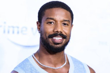 American actor Michael B. Jordan wearing a Chanel top and The Row trousers arrives at the Los Angeles Premiere Of Amazon Prime Video's 'The Lord Of The Rings: The Rings Of Power' Season 1 held at The Culver Studios on August 15, 2022 in Culver City
