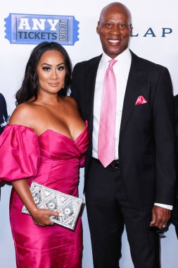 Cecilia Gutierrez and husband/American former professional basketball player Byron Scott arrive at the 22nd Annual Harold And Carole Pump Foundation Gala held at The Beverly Hilton Hotel on August 19, 2022 in Beverly Hills, Los Angeles, California