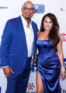 American former professional baseball player David Justice and wife Rebecca Villalobos arrive at the 22nd Annual Harold And Carole Pump Foundation Gala held at The Beverly Hilton Hotel on August 19, 2022 in Beverly Hills, Los Angeles, California