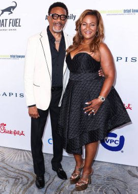 Judge Greg Mathis and wife Linda Reese arrive at the 22nd Annual Harold And Carole Pump Foundation Gala held at The Beverly Hilton Hotel on August 19, 2022 in Beverly Hills, Los Angeles, California, United States. 