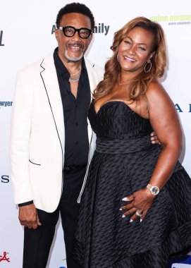 Judge Greg Mathis and wife Linda Reese arrive at the 22nd Annual Harold And Carole Pump Foundation Gala held at The Beverly Hilton Hotel on August 19, 2022 in Beverly Hills, Los Angeles, California, United States. 