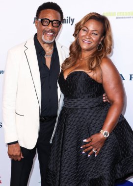 Judge Greg Mathis and wife Linda Reese arrive at the 22nd Annual Harold And Carole Pump Foundation Gala held at The Beverly Hilton Hotel on August 19, 2022 in Beverly Hills, Los Angeles, California, United States.