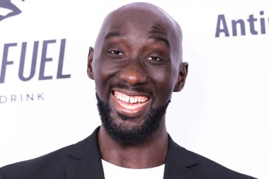 Senegalese professional basketball player Tacko Fall arrives at the 22nd Annual Harold And Carole Pump Foundation Gala held at The Beverly Hilton Hotel on August 19, 2022 in Beverly Hills, Los Angeles, California, United States. 