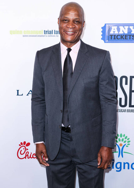 American former professional baseball right fielder Darryl Strawberry arrives at the 22nd Annual Harold And Carole Pump Foundation Gala held at The Beverly Hilton Hotel on August 19, 2022 in Beverly Hills, Los Angeles, California, United States. 