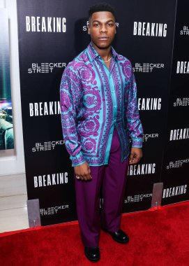 British actor John Boyega arrives at the Los Angeles Special Screening Of Bleecker Street Media's 'Breaking' held at The London Hotel West Hollywood at Beverly Hills on August 24, 2022 in West Hollywood, Los Angeles, California, United States. 