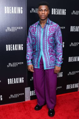 British actor John Boyega arrives at the Los Angeles Special Screening Of Bleecker Street Media's 'Breaking' held at The London Hotel West Hollywood at Beverly Hills on August 24, 2022 in West Hollywood, Los Angeles, California, United States. 