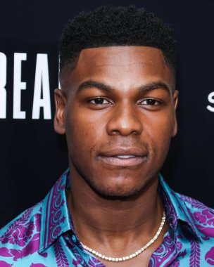 British actor John Boyega arrives at the Los Angeles Special Screening Of Bleecker Street Media's 'Breaking' held at The London Hotel West Hollywood at Beverly Hills on August 24, 2022 in West Hollywood, Los Angeles, California, United States. 