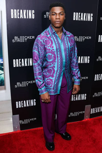 British actor John Boyega arrives at the Los Angeles Special Screening Of Bleecker Street Media's 'Breaking' held at The London Hotel West Hollywood at Beverly Hills on August 24, 2022 in West Hollywood, Los Angeles, California, United States. 