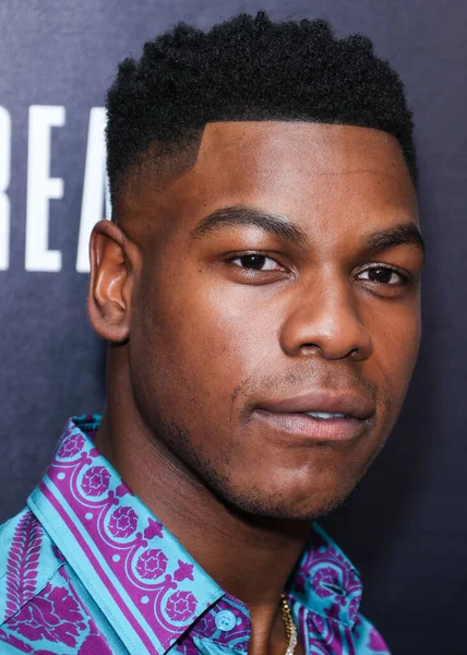 British actor John Boyega arrives at the Los Angeles Special Screening Of Bleecker Street Media's 'Breaking' held at The London Hotel West Hollywood at Beverly Hills on August 24, 2022 in West Hollywood, Los Angeles, California, United States. 