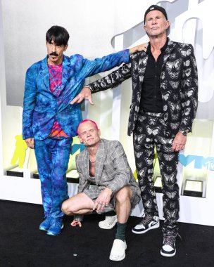 Anthony Kiedis, Flea and Chad Smith of Red Hot Chili Peppers arrive at the 2022 MTV Video Music Awards held at the Prudential Center on August 28, 2022 in Newark, New Jersey, United States.