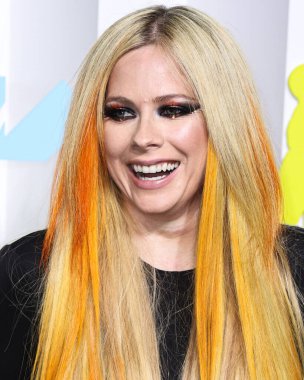 Avril Lavigne arrives at the 2022 MTV Video Music Awards held at the Prudential Center on August 28, 2022 in Newark, New Jersey, United States.