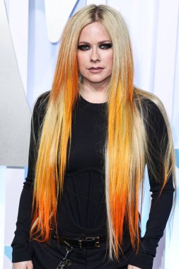 Avril Lavigne arrives at the 2022 MTV Video Music Awards held at the Prudential Center on August 28, 2022 in Newark, New Jersey, United States.