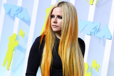 Avril Lavigne arrives at the 2022 MTV Video Music Awards held at the Prudential Center on August 28, 2022 in Newark, New Jersey, United States.