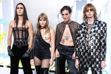 Ethan Torchio, Victoria De Angelis, Damiano David and Thomas Raggi of Maneskin arrive at the 2022 MTV Video Music Awards held at the Prudential Center on August 28, 2022 in Newark, New Jersey, United States. 