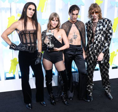 Ethan Torchio, Victoria De Angelis, Damiano David and Thomas Raggi of Maneskin arrive at the 2022 MTV Video Music Awards held at the Prudential Center on August 28, 2022 in Newark, New Jersey, United States.