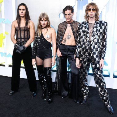 Ethan Torchio, Victoria De Angelis, Damiano David and Thomas Raggi of Maneskin arrive at the 2022 MTV Video Music Awards held at the Prudential Center on August 28, 2022 in Newark, New Jersey, United States