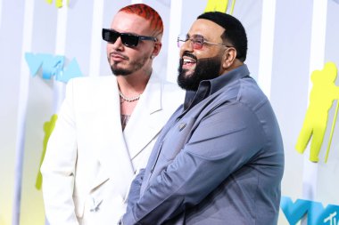 J Balvin and DJ Khaled arrive at the 2022 MTV Video Music Awards held at the Prudential Center on August 28, 2022 in Newark, New Jersey, United States. 