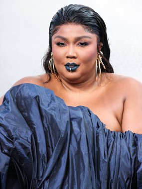 Lizzo wearing a Jean Paul Gaultier Couture dress arrives at the 2022 MTV Video Music Awards held at the Prudential Center on August 28, 2022 in Newark, New Jersey, United States.