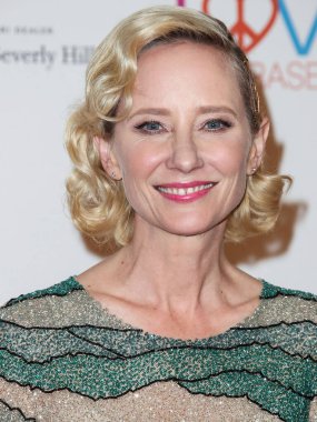 BEVERLY HILLS, LOS ANGELES, CALIFORNIA, USA - APRIL 20: American actress Anne Heche arrives at the 25th Annual Race To Erase MS Gala held at The Beverly Hilton Hotel on April 20, 2018 in Beverly Hills California, United States.