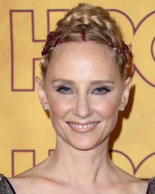 WEST HOLLYWOOD, LOS ANGELES, CALIFORNIA, USA - SEPTEMBER 17: American actress Anne Heche arrives at the HBO Emmy Awards After Party 2017 held at The Plaza at the Pacific Design Center on September 17, 2017 in West Hollywood clipart