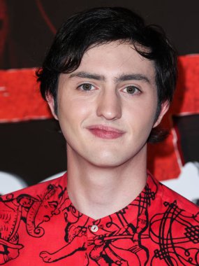 American actor Gianni DeCenzo arrives at the Los Angeles Premiere Of Netflix's 'Cobra Kai' Season 5 held at the Los Angeles State Historic Park on September 7, 2022 in Los Angeles, California, United States.