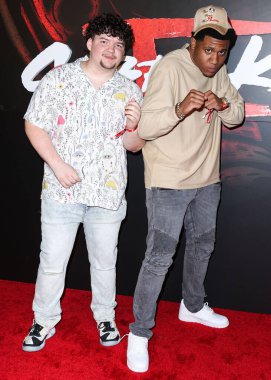 Aedin Mincks and Khalil Everage arrive at the Los Angeles Premiere Of Netflix's 'Cobra Kai' Season 5 held at the Los Angeles State Historic Park on September 7, 2022 in Los Angeles, California, United States.