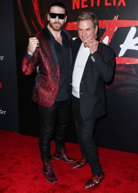 Jesse Kove and Martin Kove arrive at the Los Angeles Premiere Of Netflix's 'Cobra Kai' Season 5 held at the Los Angeles State Historic Park on September 7, 2022 in Los Angeles, California, United States.