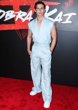 American actor Tanner Buchanan arrives at the Los Angeles Premiere Of Netflix's 'Cobra Kai' Season 5 held at the Los Angeles State Historic Park on September 7, 2022 in Los Angeles, California, United States.