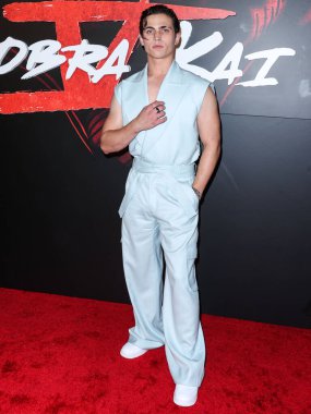 American actor Tanner Buchanan arrives at the Los Angeles Premiere Of Netflix's 'Cobra Kai' Season 5 held at the Los Angeles State Historic Park on September 7, 2022 in Los Angeles, California, United States.