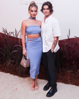 Emma Brooks McAllister ve Zack Lugo REVOLVE Galerisi NYFW 'ye (New York Moda Haftası) 8 Eylül 2022' de Hudson Yards 'daki The Shops' ta düzenlenen sunum VIP açılış etkinliğine geldiler..